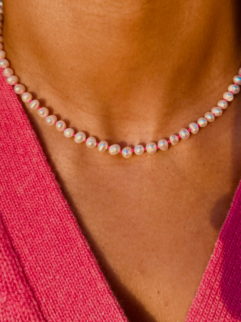 Fine Freshwater Pearl Necklace with a Neon Pink Thread