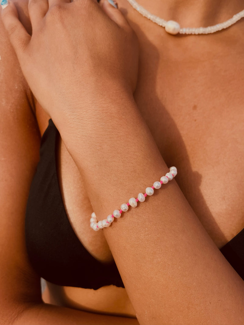 Fine Freshwater Pearl Bracelet with a Neon Pink Thread
