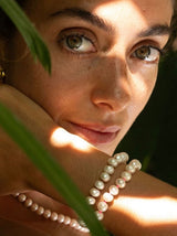 Freshwater Pearl Bracelet with a Neon Pink Thread