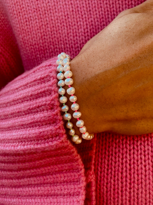 Fine Freshwater Pearl Bracelet with a Neon Pink Thread