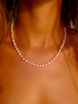 Fine Freshwater Pearl Necklace with a Neon Pink Thread