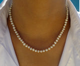 Fine Freshwater Pearl Necklace with a Gold Thread